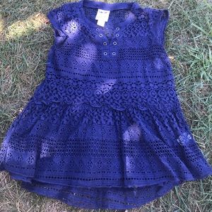 Blue shirt or dress.